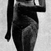 Обнаженная девушка. Деревянная статуэтка. XVIII династия. Конец 15 в. до н. э. Париж. Лувр